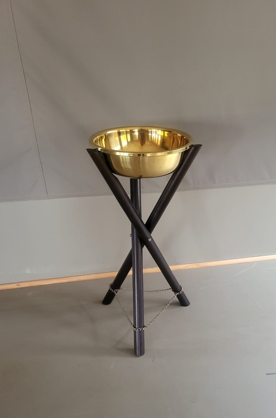 Sabora Brass Basin and Stand - Polished Brass Vessel on Dark Timber Tripod.
