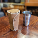 Cup cladding in chestnut leather